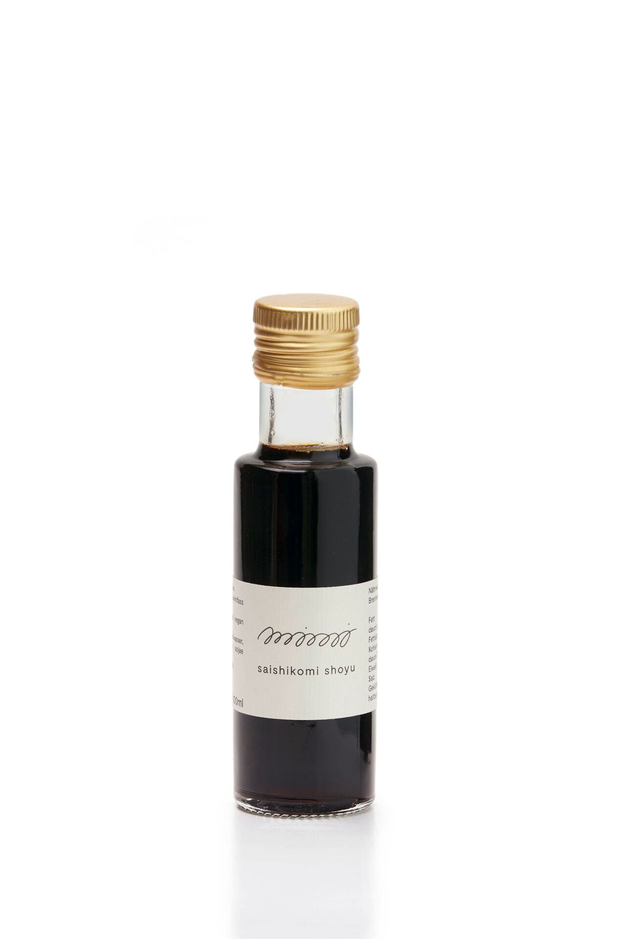 Beste Sojasauce Platz 1, braune Flüssigkeit in Flasche, Messingdeckel